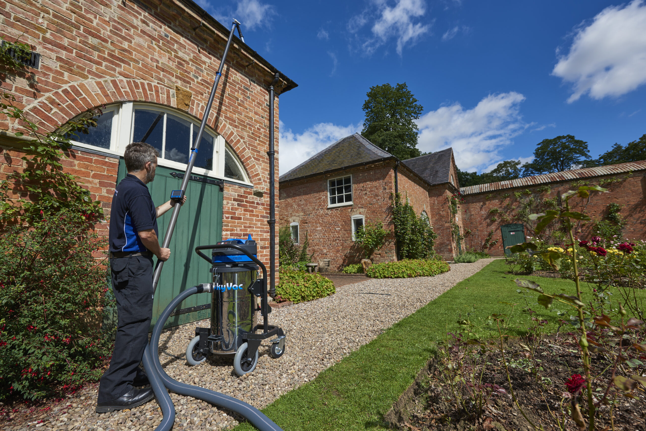 Sky Vac gutter cleaning system
