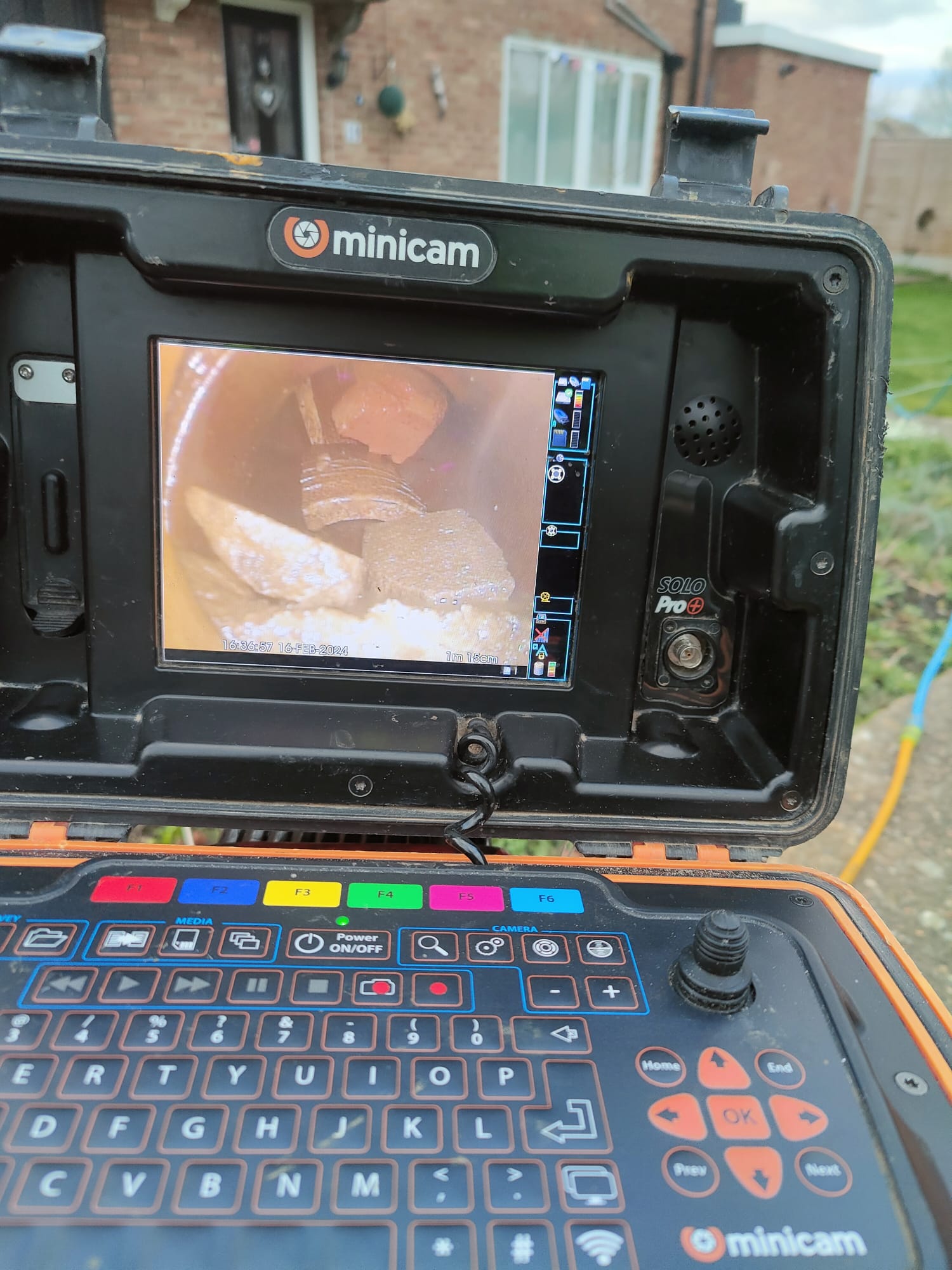 Camera showing the old vent line going to ground and allowing rodents full access to the system.